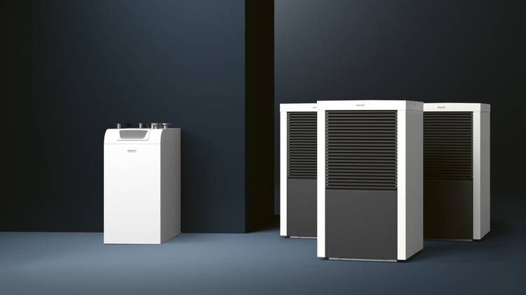 Alt-Text: „Moderne Heizungs-, Lüftungs- und Klimaanlagen (HLK) vor einem dunkelblauen Hintergrund, symbolisierend fortschrittliche Technologien zur Energieeffizienzsteigerung in der Gebäudetechnikbranche.