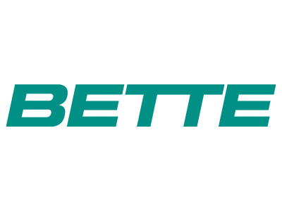 Firmenlogo von BETTE in kräftigen, türkisfarbenen Großbuchstaben auf hellgrauem Hintergrund, Hersteller für Sanitärtechnik und Badlösungen.