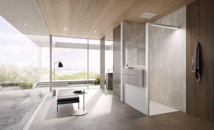 Barrierearmer, moderner Badbereich mit bodentiefen Fenstern und energieeffizienten Sanitärobjekten, Ausblick auf Dünenlandschaft und Meer.