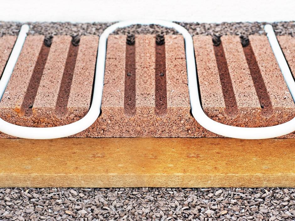 Bodensystem für Fußbodenheizung: Wärme- und Trittschalldämmung in einem Bodensystem für Fußbodenheizung: Wärme- und Trittschalldämmung in einem