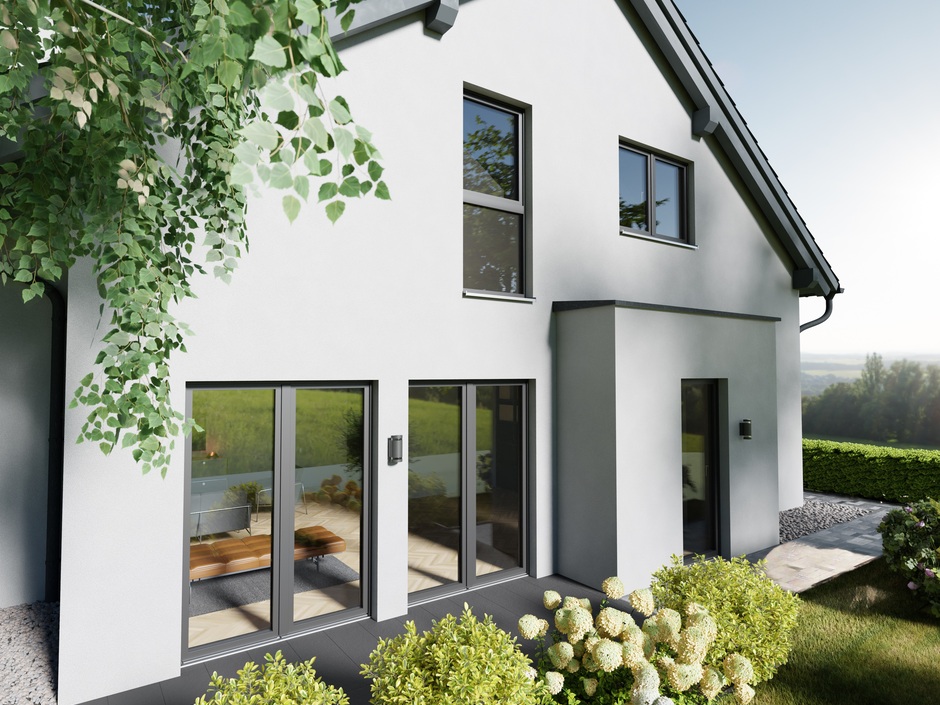 Fassade mit modernen Fenstersystemen - Leistungsfähige Kunststoff-Fenster in modernem Design werten das Eigenheim nicht nur op-tisch auf, sondern nehmen auch großen Einfluss auf die Wärmedämmung der Gebäudehülle.