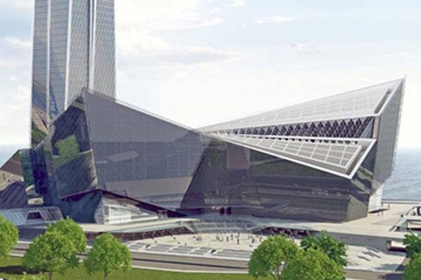 Die von Glas umhüllten Bauten schwingen wellenartig vom Turm – ein harmonisches Ensemble. Die von Glas umhüllten Bauten schwingen wellenartig vom Turm – ein harmonisches Ensemble.