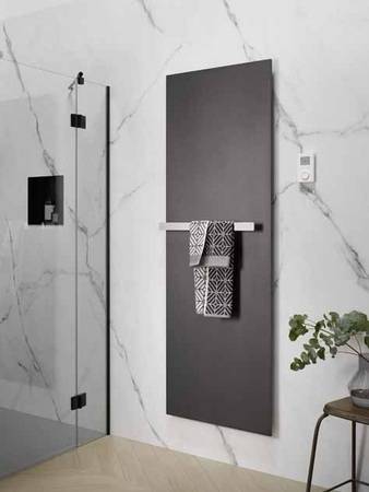 Mit seinem flachen Design und eleganter Optik fügt sich der elektrische Infrarot-Designheizkörper Retango ideal in jede Umgebung ein. Moderne Farben wie Graphit-Schwarz machen ihn zum absoluten Hingucker im Bad.