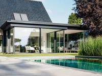 Solarlux Wintergarten mit Flachdach und Cero Schiebetüren