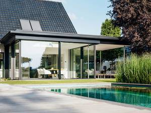 Solarlux Wintergarten mit Flachdach und Cero Schiebetüren